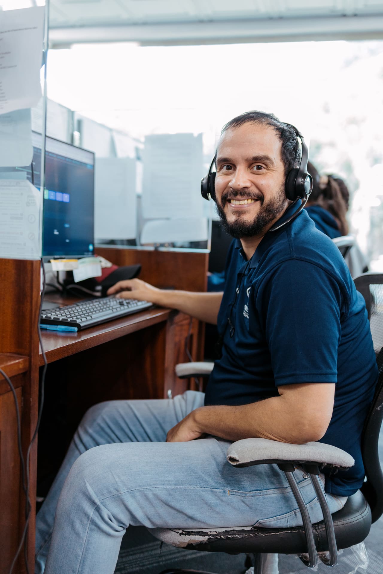 Agent smiling while on a call