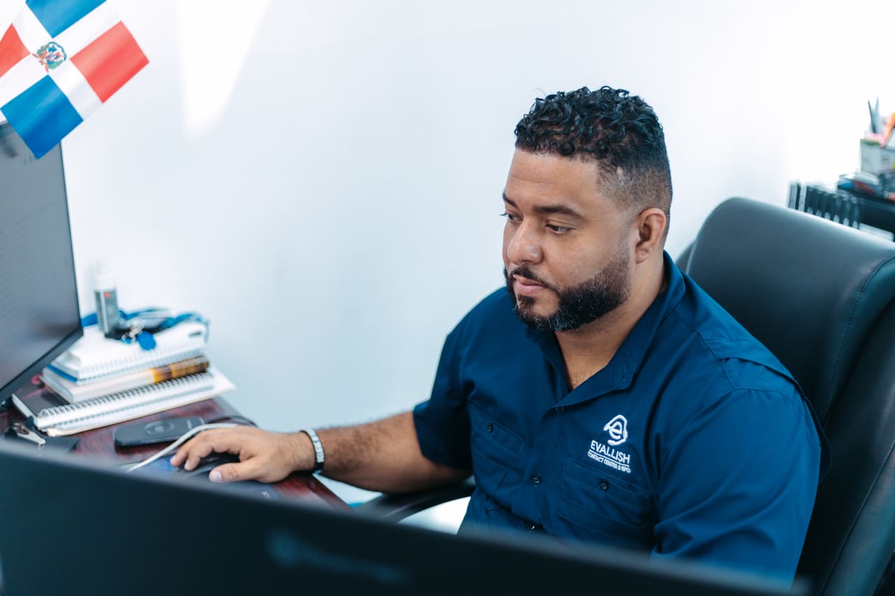 Technical support specialist at his computer